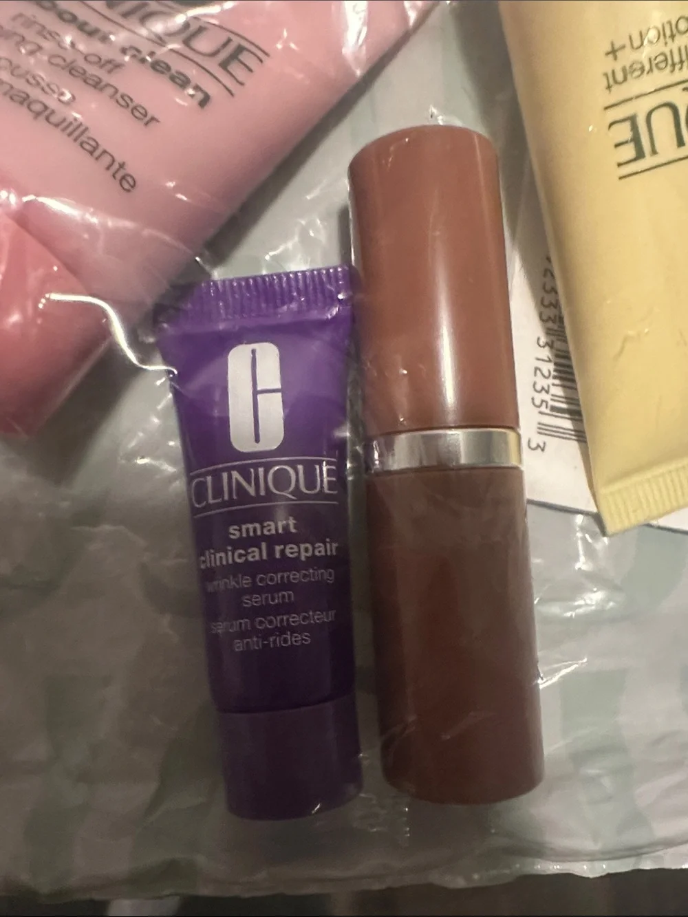 Clinique Floral Makeup Bag with Pink & Purple Travel-Sized Skincare